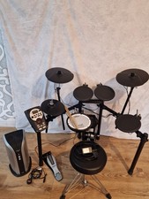 Roland TD-11 Electronic Drum Kit And Roland  PM-03 Amp / Speaker and Stool.