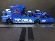 Mini GT FORD GT liquid blue on 1966 Ford C-950 Cobra Racing Truck 1:64