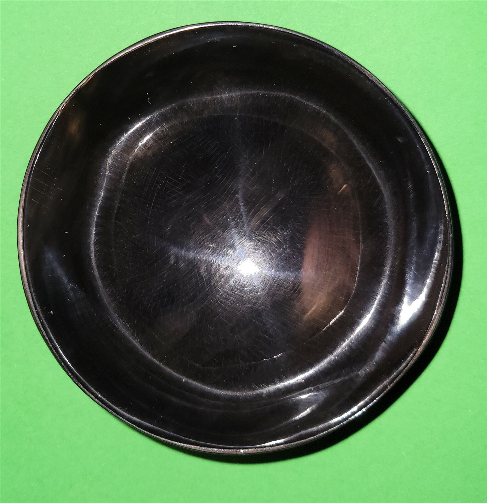 Polished buffalo horn bowl measuring 4