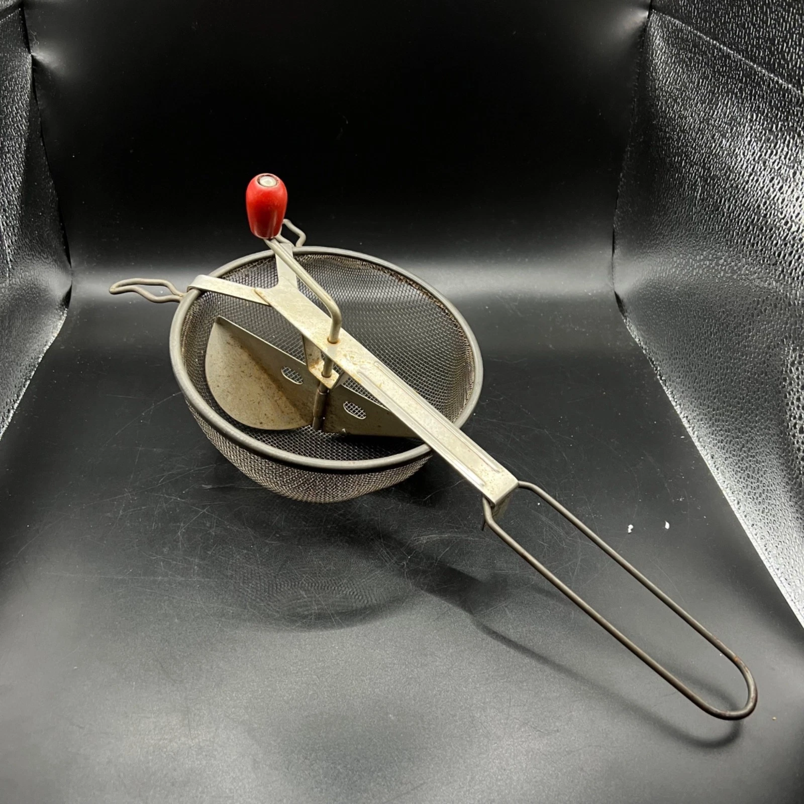 A&J Metal Food Mill Strainer With Red Wooden Handle Mesh Basket Rusty Crusty VTG