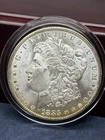 1885-O Morgan Silver Dollar Mint State Light Toning 90% Silver Sharp Strike