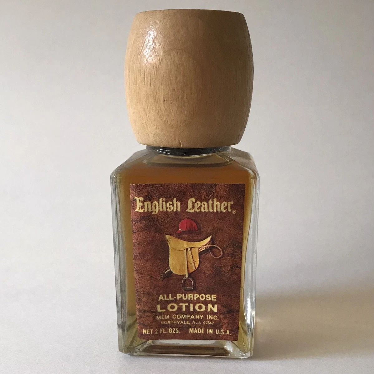 cologne with leather bottle