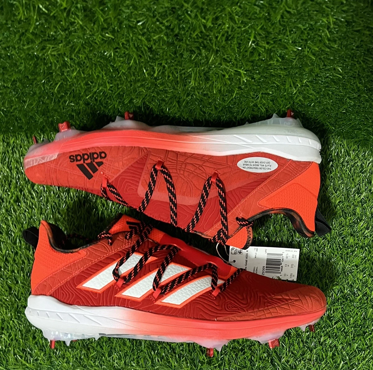 Orange adidas hotsell baseball cleats