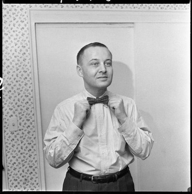 US TV sports journalist commentator Jim McKay straightens his bow - Old Photo
