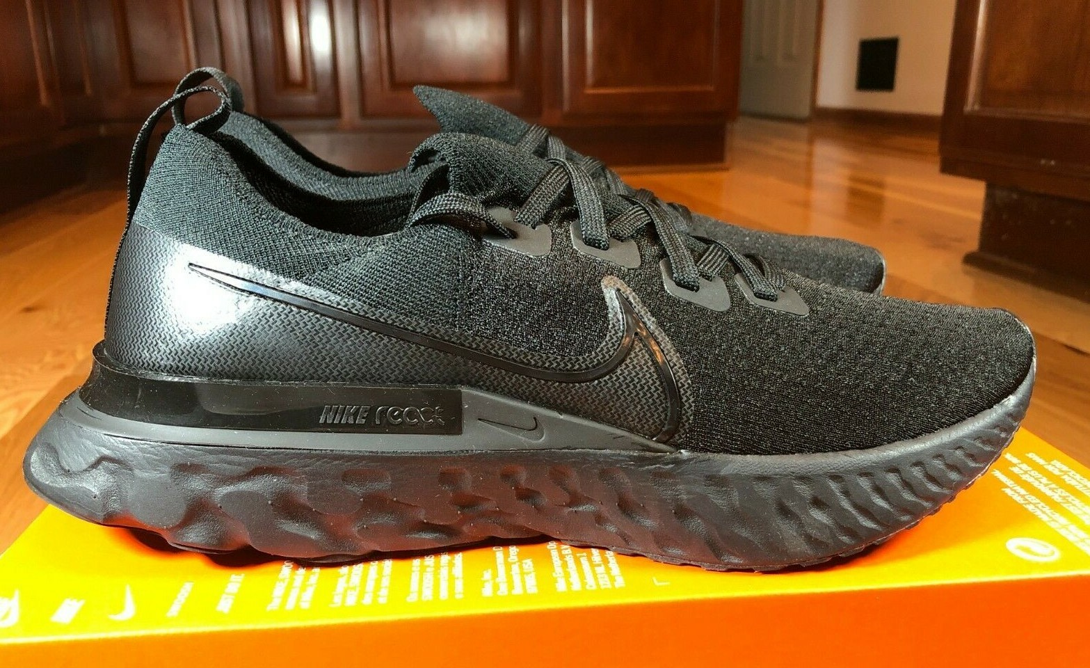 nike react infinity run flyknit triple black