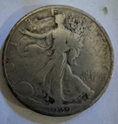 1929-S Walking Liberty half dollar in circulated condition, lower grade