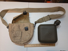 US Army 2 Qt plastic Canteen 2003 Made in USA with tan cover and shoulder strap