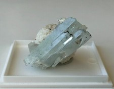 Aquamarine crystals with natural terminations on Albite matrix