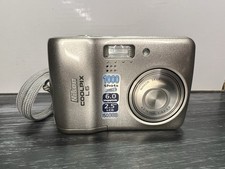 Nikon Coolpix L6 6.0MP Digital Camera Silver, ISO 800, 2.5''