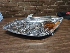 Eagle Eyes TY694-B001L Left Headlight Assembly For 02-04 Toyota Camry- DOORMAN