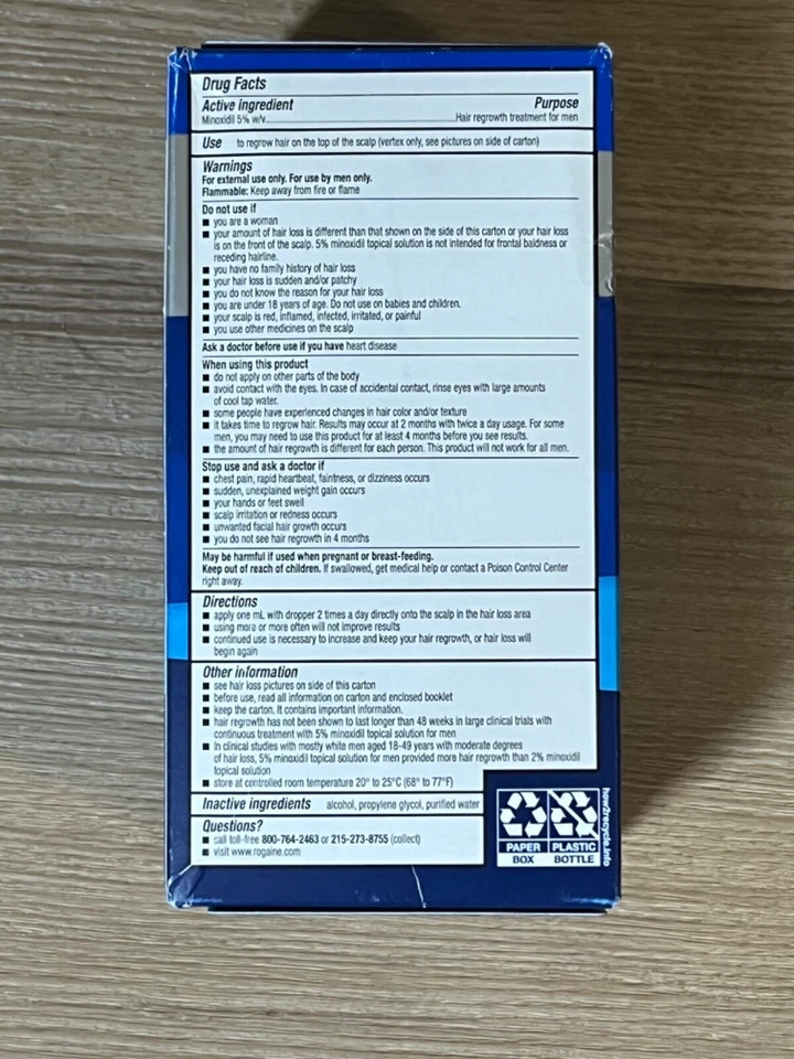 Solución tropical Rogaine Extra Strength 5% Minoxidil para la pérdida y el rebrote del cabello Foto 2 de 3