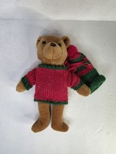 Vintage teddy bear in Christmas Sweater and hat