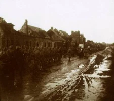Soldiers marching past bombed-out houses Champagne northern France- Old Photo