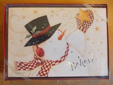 Pack of 10 Leanin' Tree Christmas cards with designed envelopes.