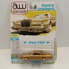 1979 LINCOLN CONTINENTAL LOWRIDER GOLD 1/64 CAR BY AUTO WORLD .