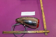 Reproduction Tail Light. See pics. Found without packaging.