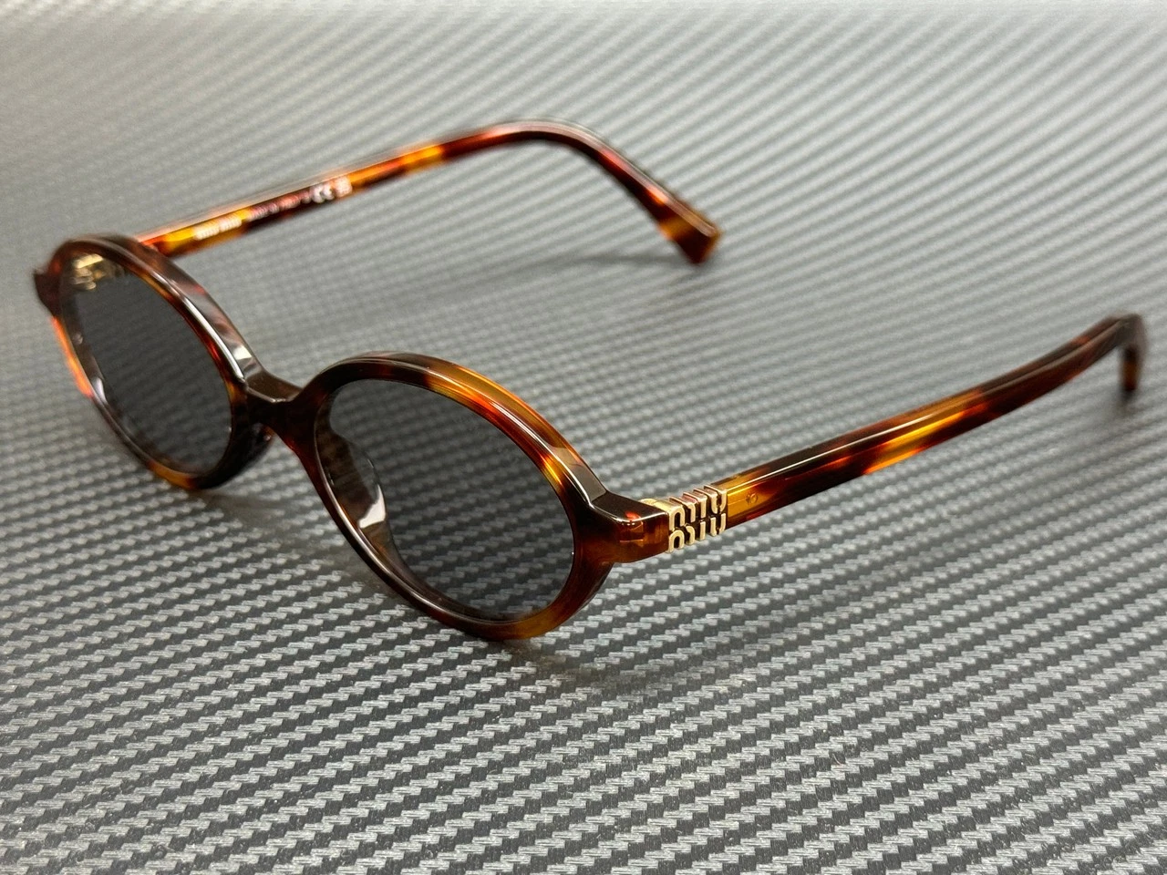 Miu Miu — MIU MIU MU 04ZS 21C40O Havana Mahogany Grey Women's 50 mm Sunglasses