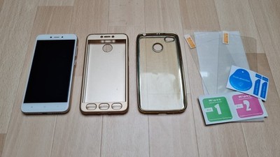 Xiaomi  Redmi 4X - Roségold (Ohne Simlock) Smartphone Handy + 2 Cases + 2 Folien