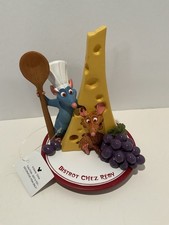 Walt Disney Epcot BISTRO CHEZ REMY Ratatouille Estatuilla París Vitrina Ratones