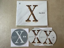 Mac OS X 10.2 Jaguar install discs + developer tools disc and Mac OS X manual