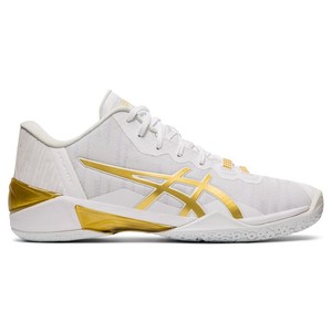 gold and white basketball shoes
