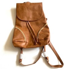 Brown backpack with zipper accented detailing on front, NWOT