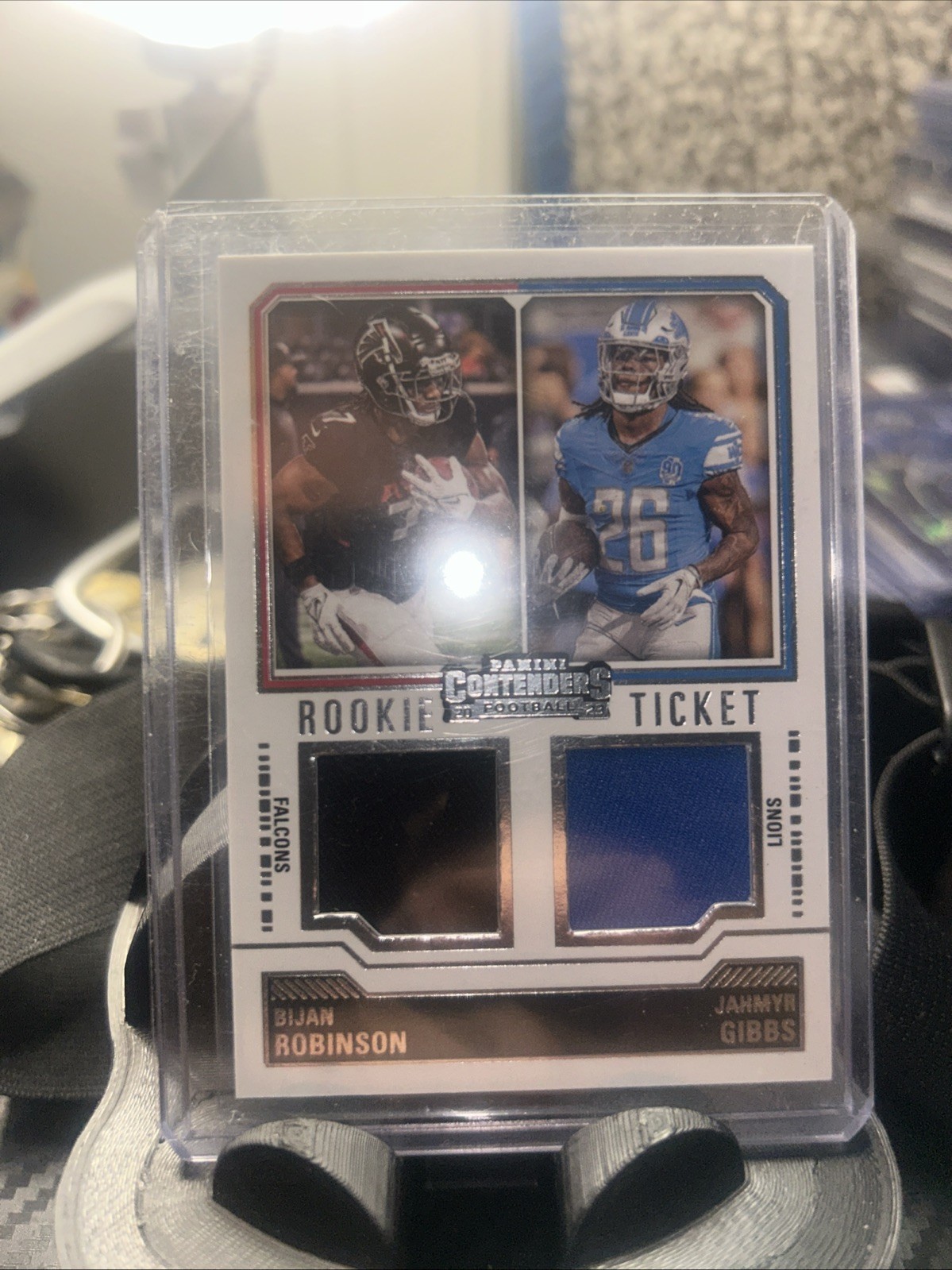 2023 Panini Contenders Bijan Robinson Jahmyr Gibbs #DS-8 Rookie Dual Patch (RC)