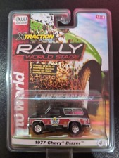 AUTO WORLD 1977 CHEVYBLAZER X TRACTION BLACK/RED