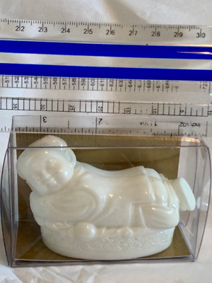 Sleeping boy Recumbent Child - White Pillow in the shape of a Recumbent Child. 