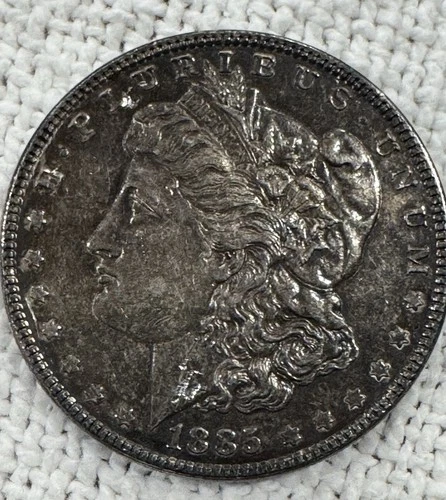 1885  Morgan Silver Dollar 90% AU Gun Toned