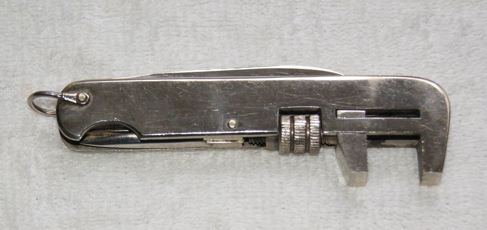 A Hoffritz pocket knife with a built-in folding monkey wrench — a genuinely weird and wonderful piece of vintage multi-tool engineering you won't find anywhere else.