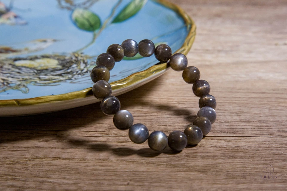 Pulsera con cuentas de piedra solar negra natural de alta calidad de 11 mm | 黑骨干手串 Foto 2 de 4