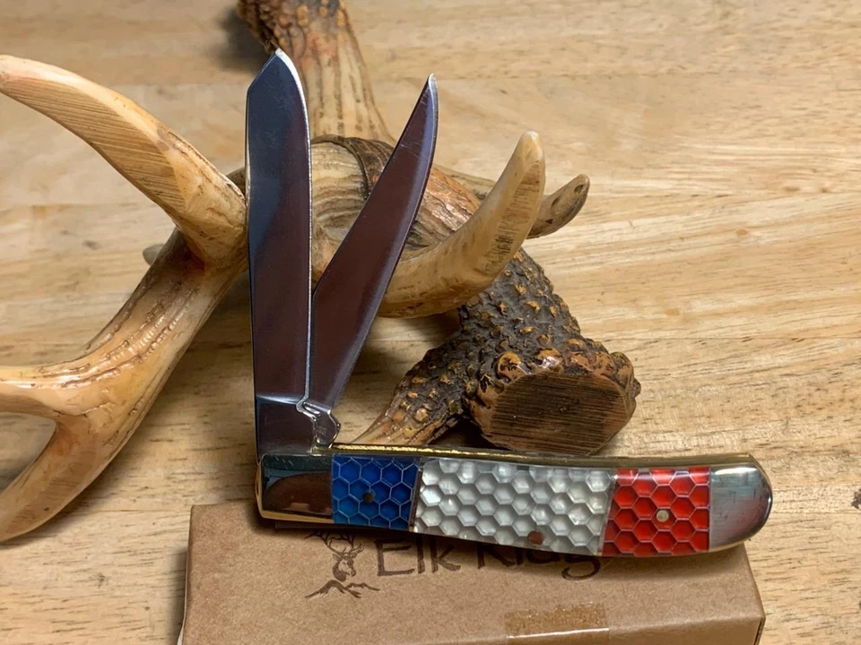 Navaja de bolsillo Elk Ridge roja, blanca y azul C-Tek Trapper 3 1/2" ER946 Foto 3 de 4