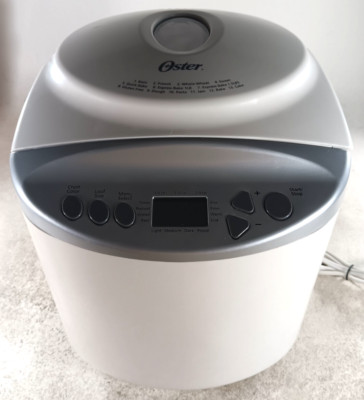 Oster CKSTBR9050 Bread Maker 2 lb Loaf White with Accessories