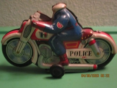 Vintage HAJI TIN TOY POLICE MULTI COLOR MOTORCYCLE (MADE IN JAPAN)