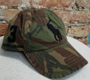 tan polo hat with leather strap