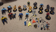 Lotto 18 action figure e accessori Star Trek assortiti vintage.
