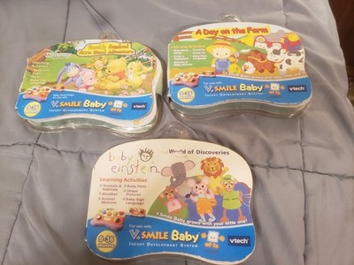 V Tech V. Smile Baby Lot of  Game Cartridges Baby Einstein,Winnie the Pooh etc..