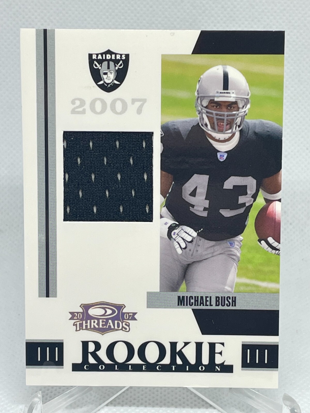 Michael Bush Donruss Threads Rookie Collection Materials #RCM28 Base