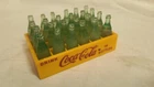 Vintage Coca Cola 24 Miniature Green Coke Bottles in Mini Plastic Yellow Crate