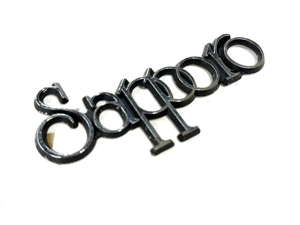 Palo de coche Plymouth Sapporo años 70-80 en emblema OEM de colección Foto 4 de 4