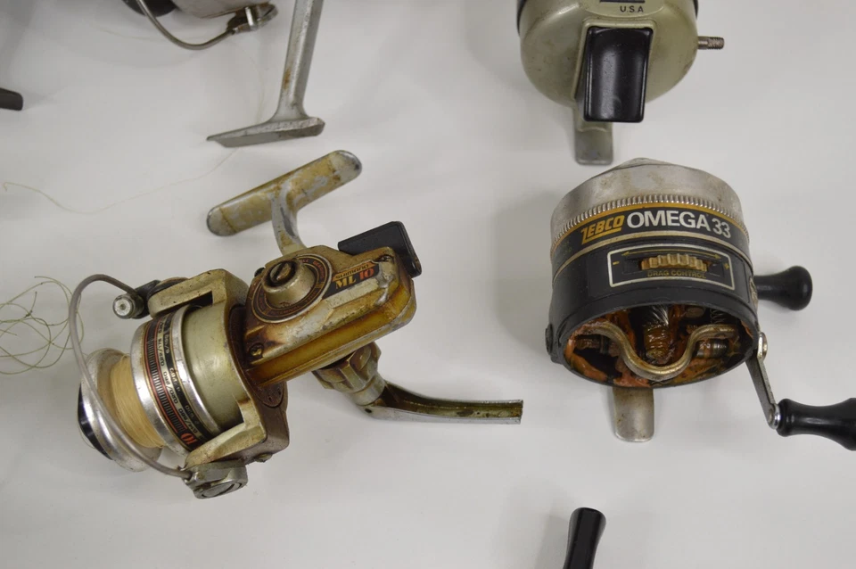 Lot of 14 Fishing Reels FOR PARTS OR REPAIR Pflueger Daiwa Shakespeare Shimano - Image 4 of 4