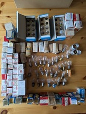 Bundle of small low voltage light bulbs of various types and vintages.