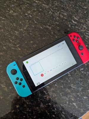 Nintendo Switch Konsole, 32GB + Neon-Rot/Blau Joy-Con