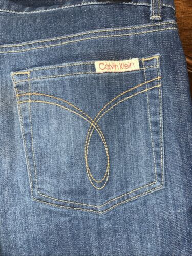 Calvin Klein Jeans Flare Medium Wash Mid Rise Stretch Women's Size 12 NWOT - Picture 6 of 7