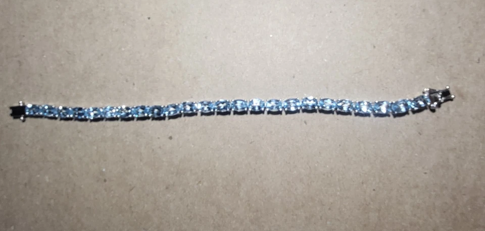 Hermosa pulsera estilo tenis circonita azul cielo en plata de ley 925, 7,25" Foto 2 de 4