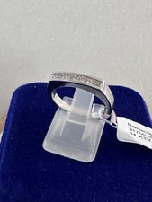 14kt.White Gold Wedding Band with princess cut diamonds size 6.5, 4.4Gr.