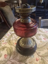 Antique Victorian Edwardian Oil Lamp with Cranberry reservoir china base Veritas