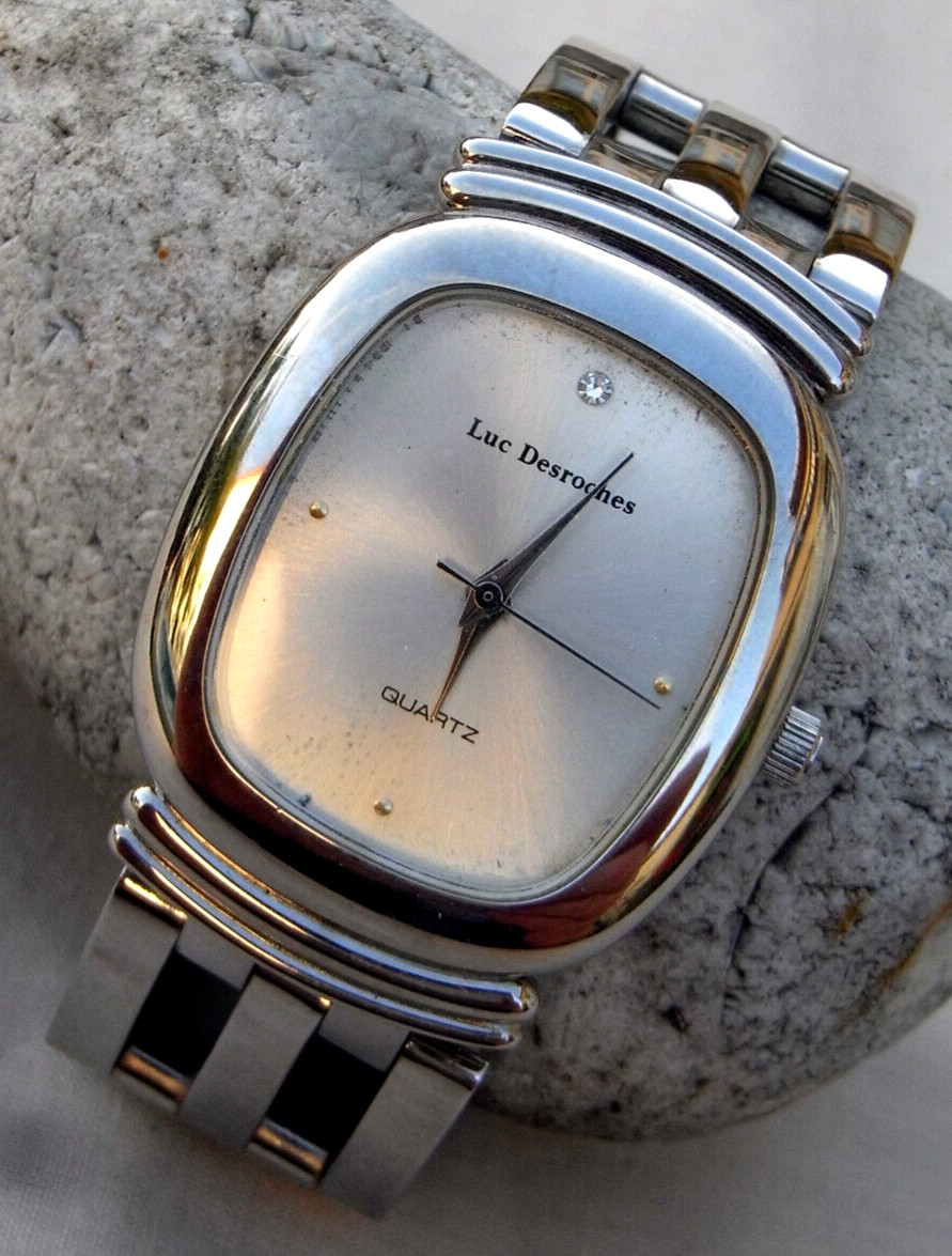 Montre Luc Desroche LDQ06 boîtier caillou plat en acier poli miroir
