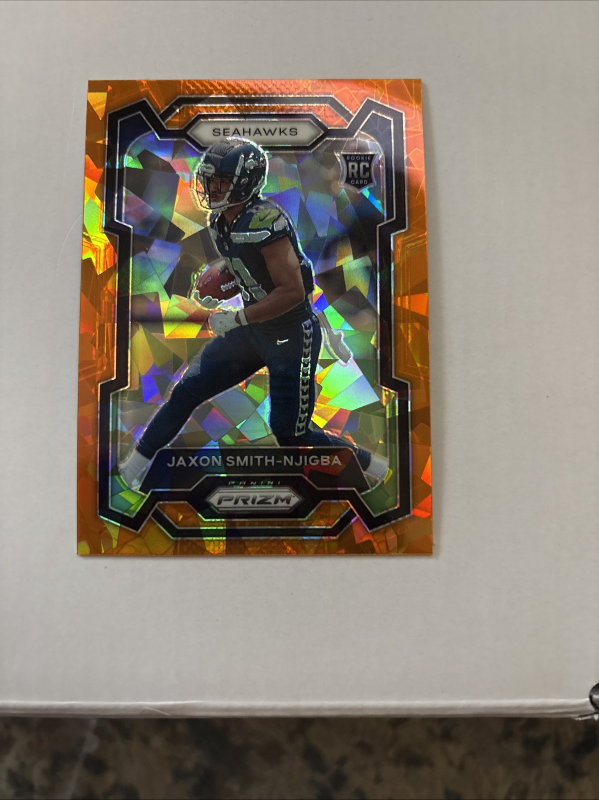 2023 Panini Prizm - Rookies Jaxon Smith-Njigba #390 Orange Ice Prizm (RC)